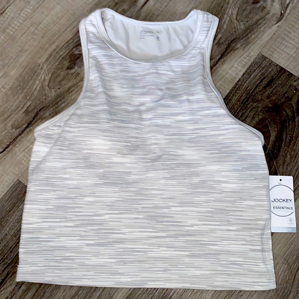 Gray and white crop style sports bra